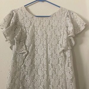 white top with short ruffle sleeve